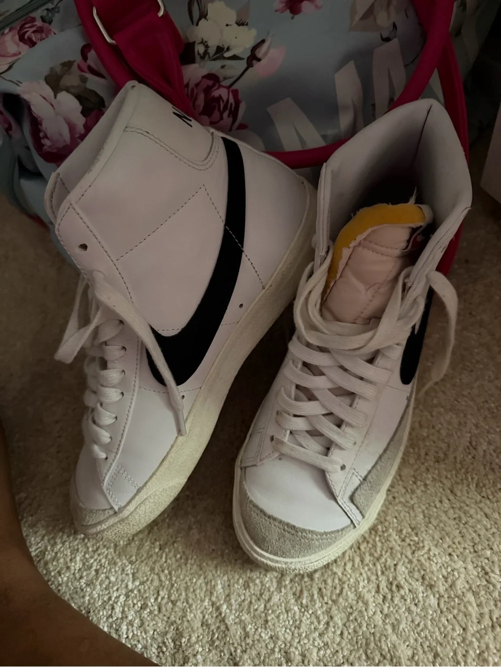 Nike Women’s White High-Top Sneakers with Black Swoosh and Yellow Tongue Accent